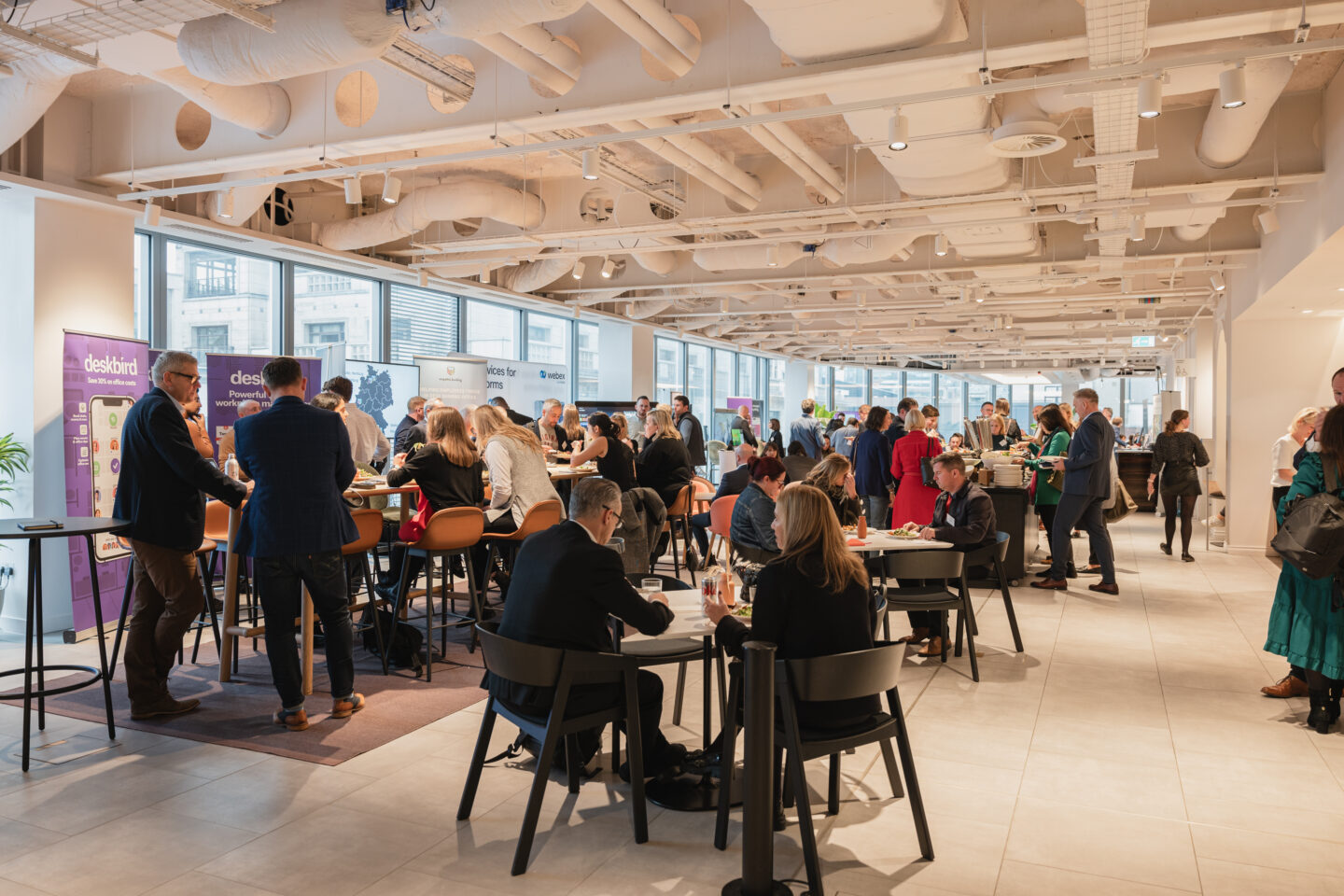 Delegates taking a break at Convene, a smart building in London