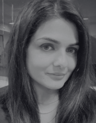 A woman with shoulder length brown hair