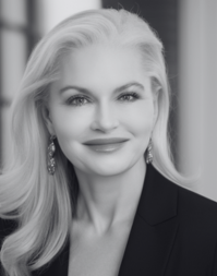 A headshot of a blonde-haired woman