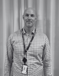 A man wearing a check shirt