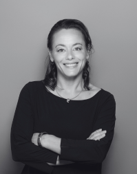 A headshot of Marja van der Most, Regional Workplace Manager at Snowflake smiling directly into the camera.