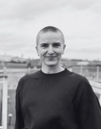 A headshot of Thit Ejstrup-Christensen, Workplace Designer, Danfoss