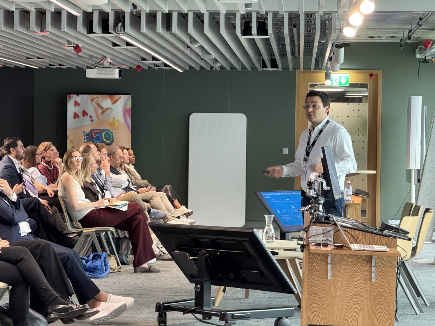 Speaker and delegates at a conference