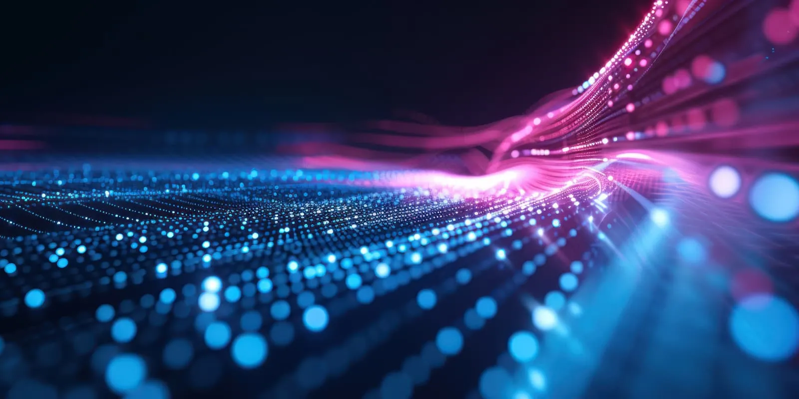 Blue and pink image of dots showing technology moving