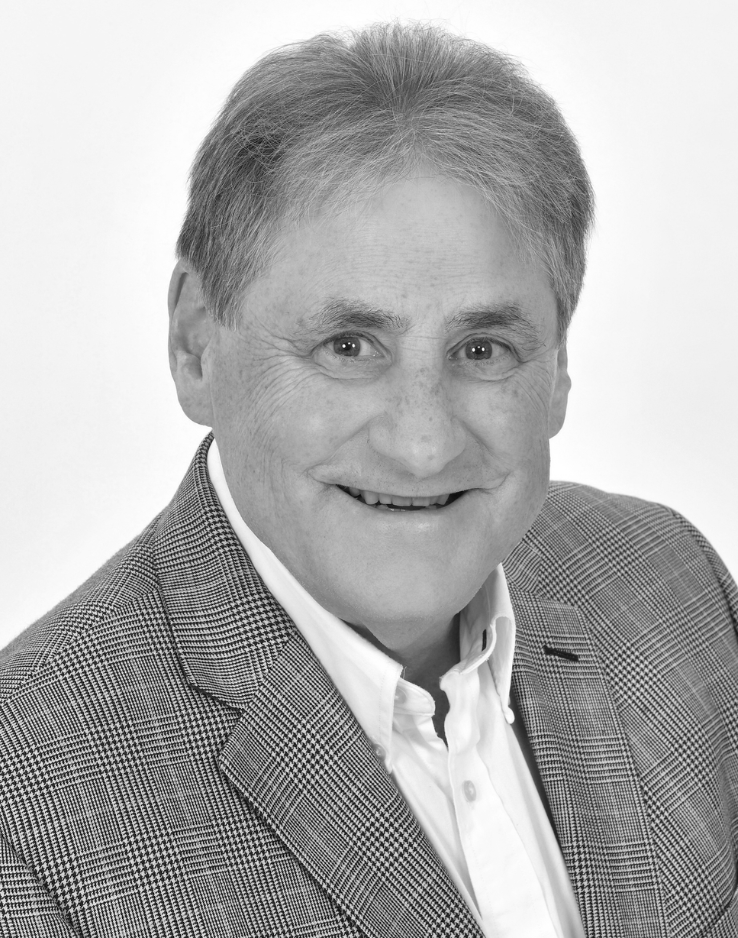 A headshot of Nick Springate, CEO, IDN Infrastructure Software Corp