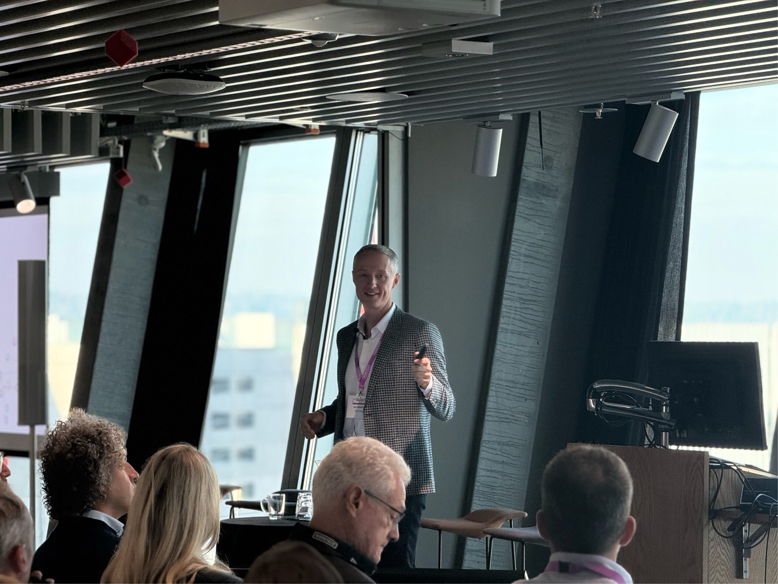 An image of a speaker on stage at the future of work conference WORKTECH26 Zurich